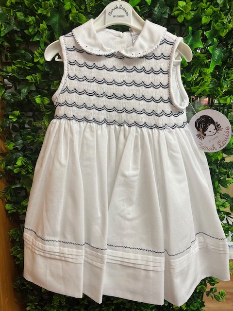 SARAH LOUISE 013240 TODDLER WHITE COTTON SMOCKED DRESS NAVY TRIM TIE BACK 2 & 3yrs only 